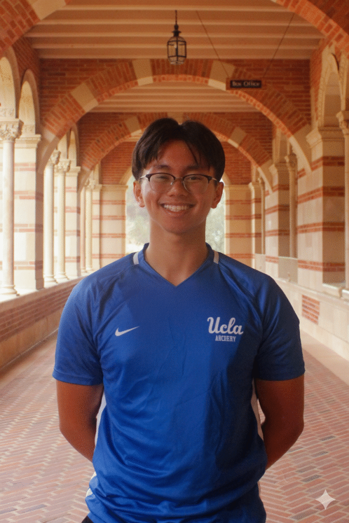 Person in blue UCLA sports shirt.